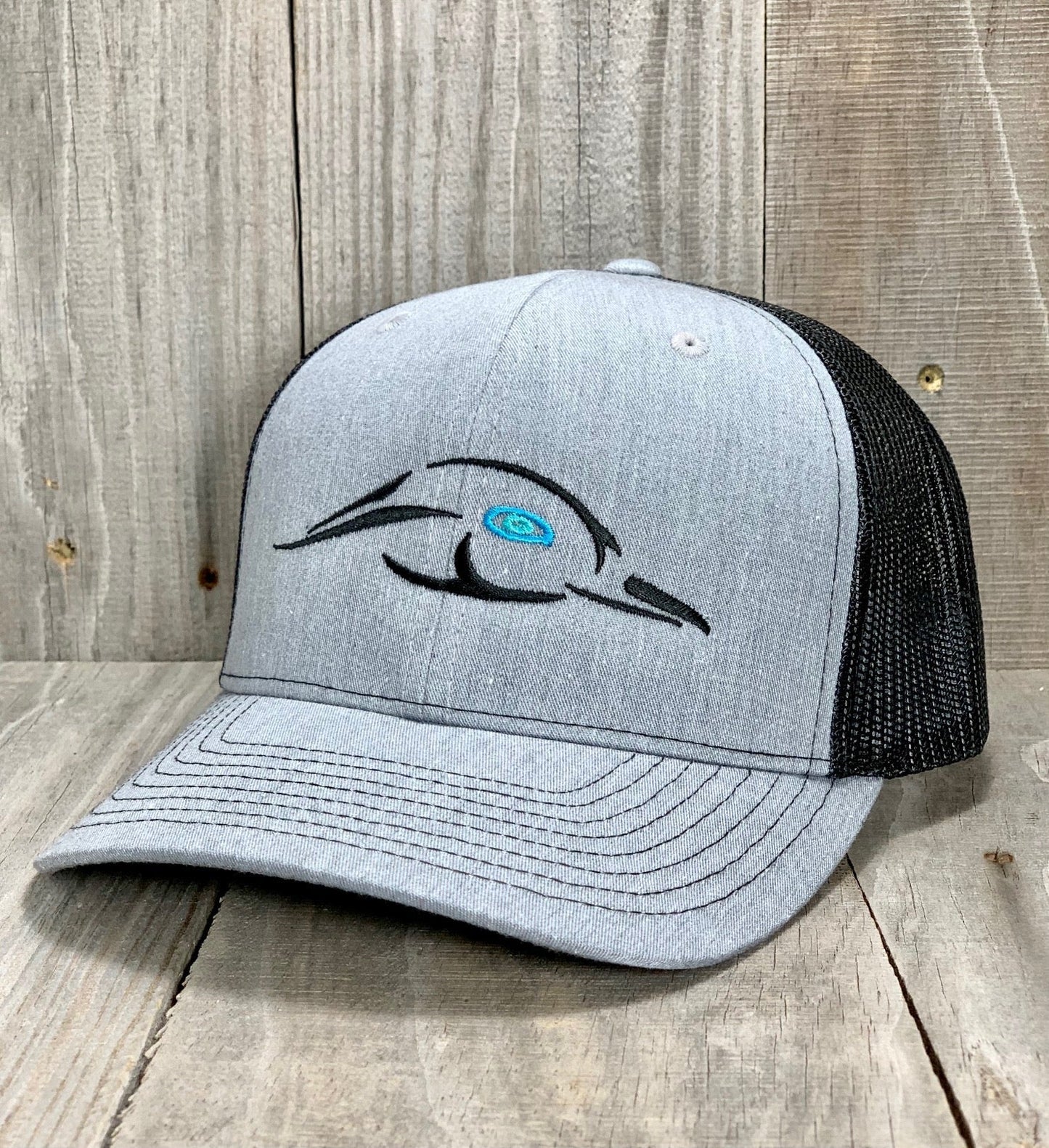 112XL Grey w/ Black Mesh Back Logo w/ Blue Eye - Angler's Pro Tackle & Outdoors