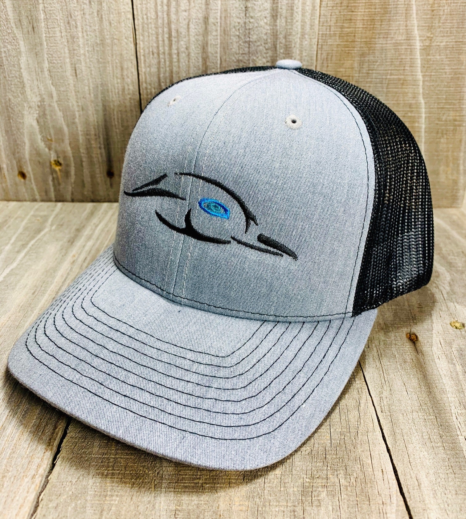 112XL Grey w/ Black Mesh Back Logo w/ Blue Eye - Angler's Pro Tackle & Outdoors