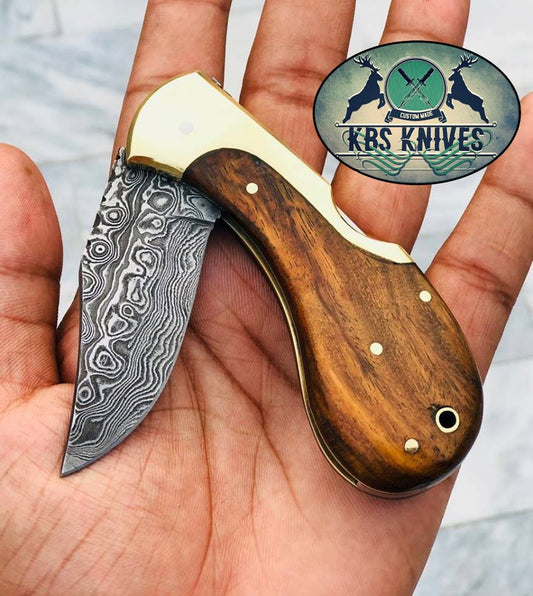 KBS Knives Custom Handmade Damascus Steel New Folding Pocket Knife with Rosewood Handle and Leather Case by KBS Knives Store.