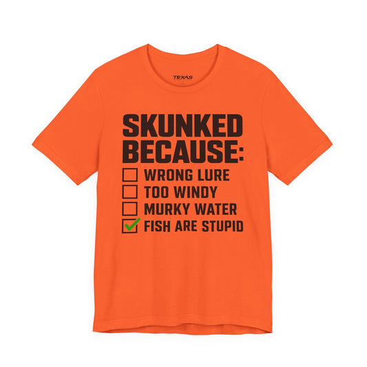 Texas Rigged Tees Skunked Because — Unisex Cotton Tee