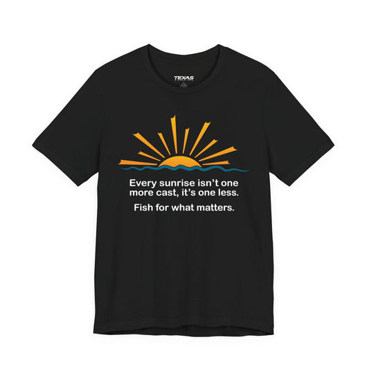 Texas Rigged Tees Every Sunrise Isn’t One More Cast, It’s One Less. Fish for What Matters. — Unisex Cotton Tee