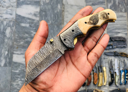 KBS Knives Custom Handmade Damascus Steel Engraved Folding Pocket Knife with Hand Engraved Bone Handle and Leather Case by KBS Knives Store.