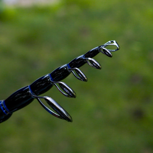 Reaction Tackle Telescopic Spinning Rod – Carbon Travel Fishing Rod – Collapsible Rod for Freshwater and Saltwater - NEW - Angler's Pro Tackle & Outdoors